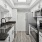 a kitchen with black counter tops