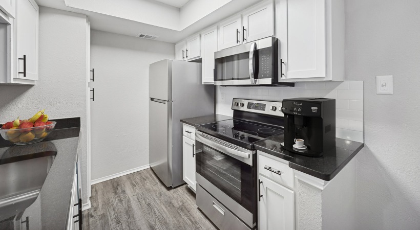 kitchen with white cabinets