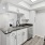 a kitchen with black counter tops