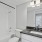 a bathroom with a black counter top