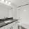 a bathroom with a black countertop